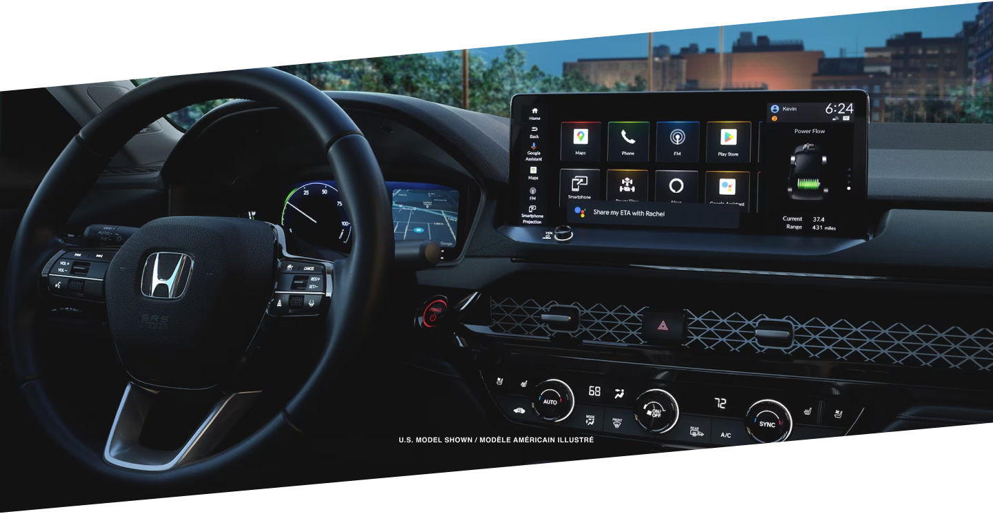 Interior wide shot of the Accord’s steering wheel and dashboard.