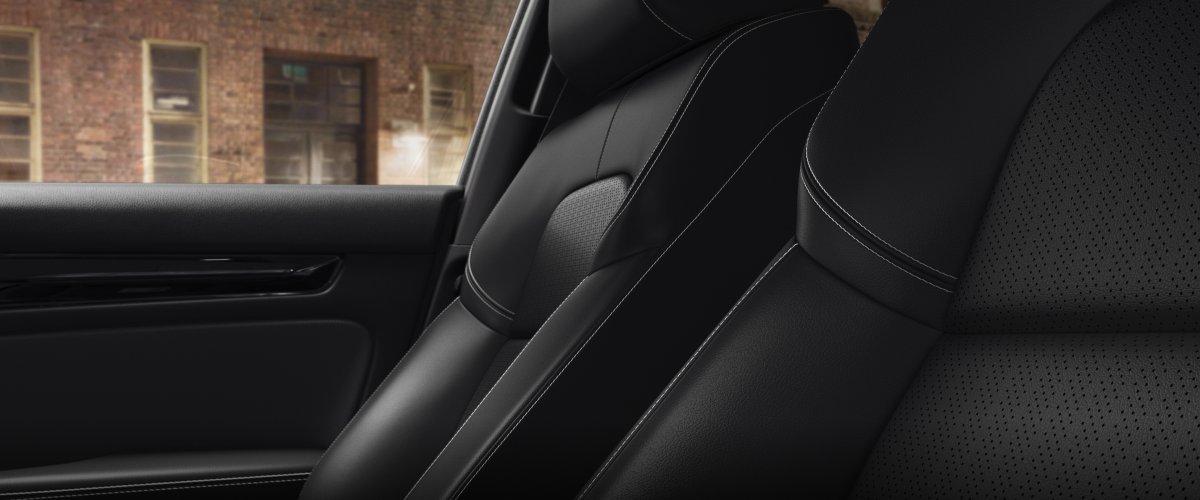 Interior closeup of seats in a hatchback.