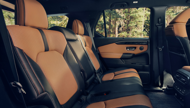 Close-up of the interiro of a Honda Passport  showing 5 passenger seating. 